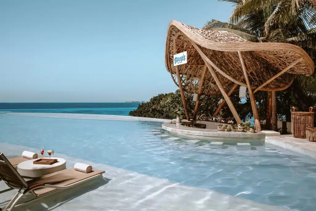 Sharks swim up bar at Impression Isla Mujeres by Yellow Umbrella Events