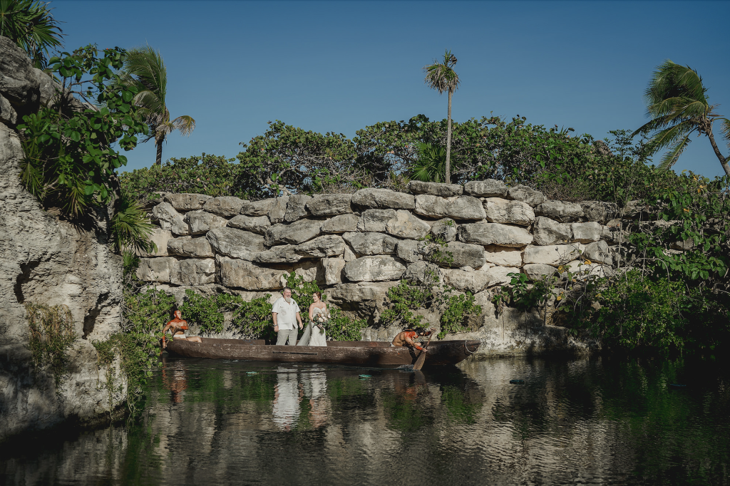 Jhankarlo Photography Canoe Enterance Hotel Xcaret Mexico Wedding for Yellow Umbrella Events