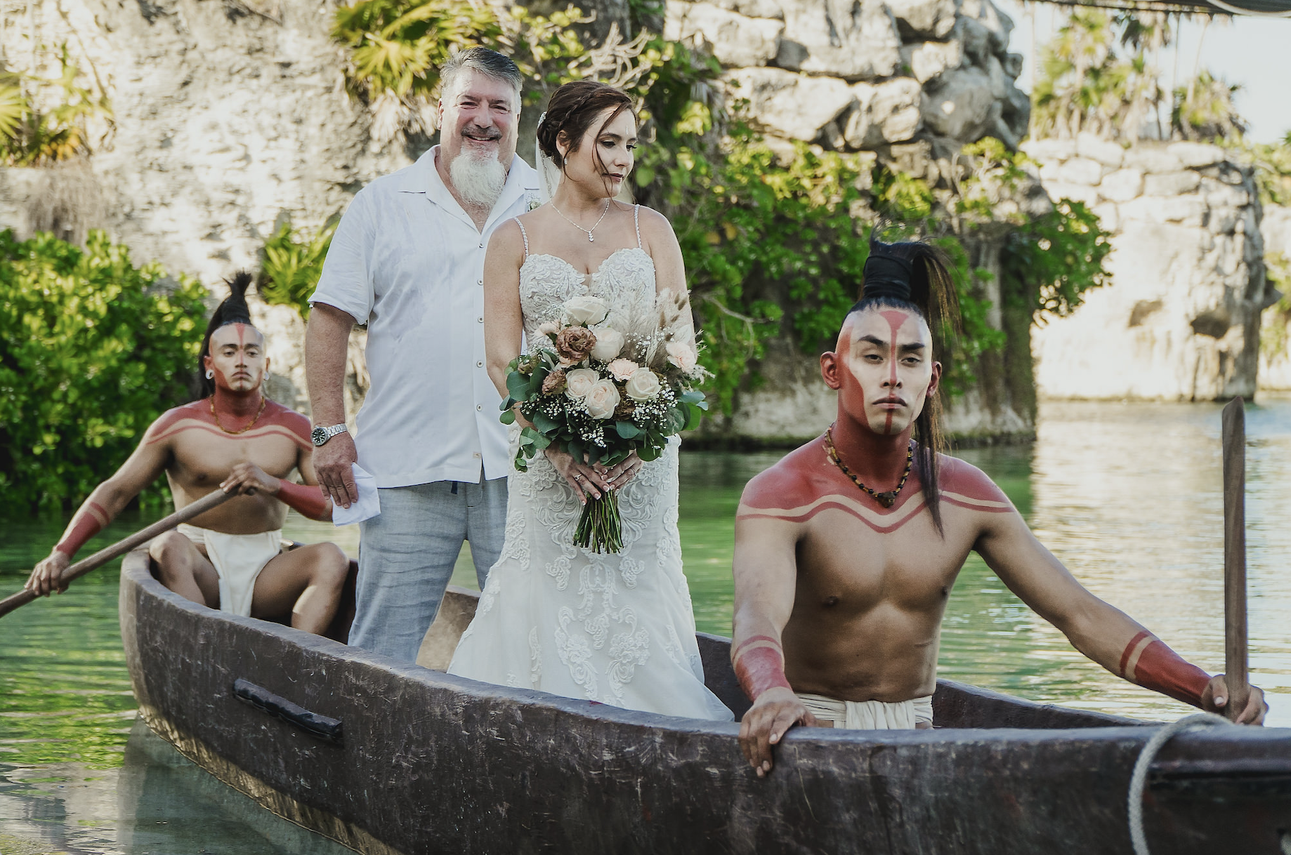 Jhankarlo Photography Canoe Enterance Hotel Xcaret Mexico Wedding for Yellow Umbrella Events